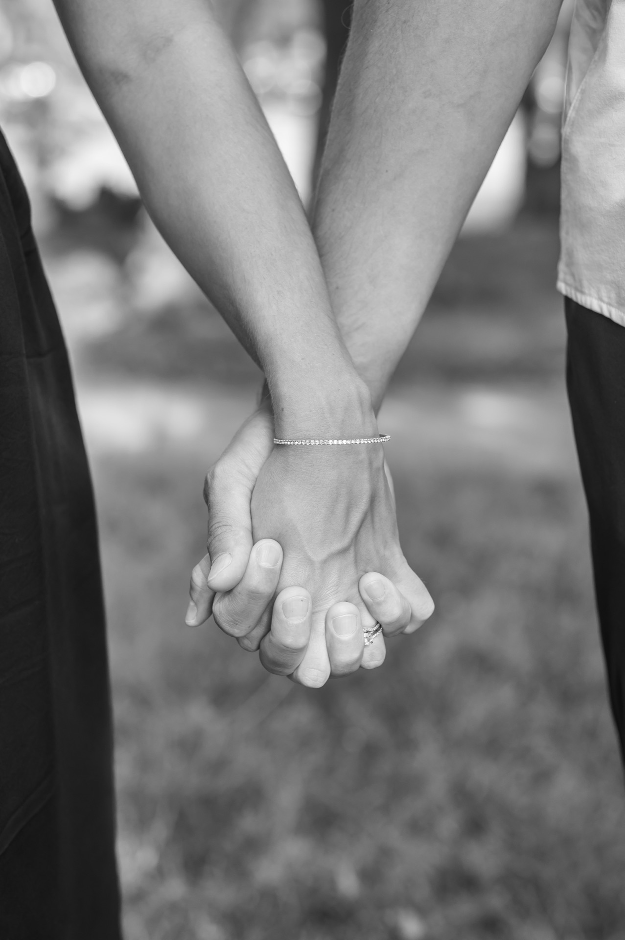 Hands holding each other in support