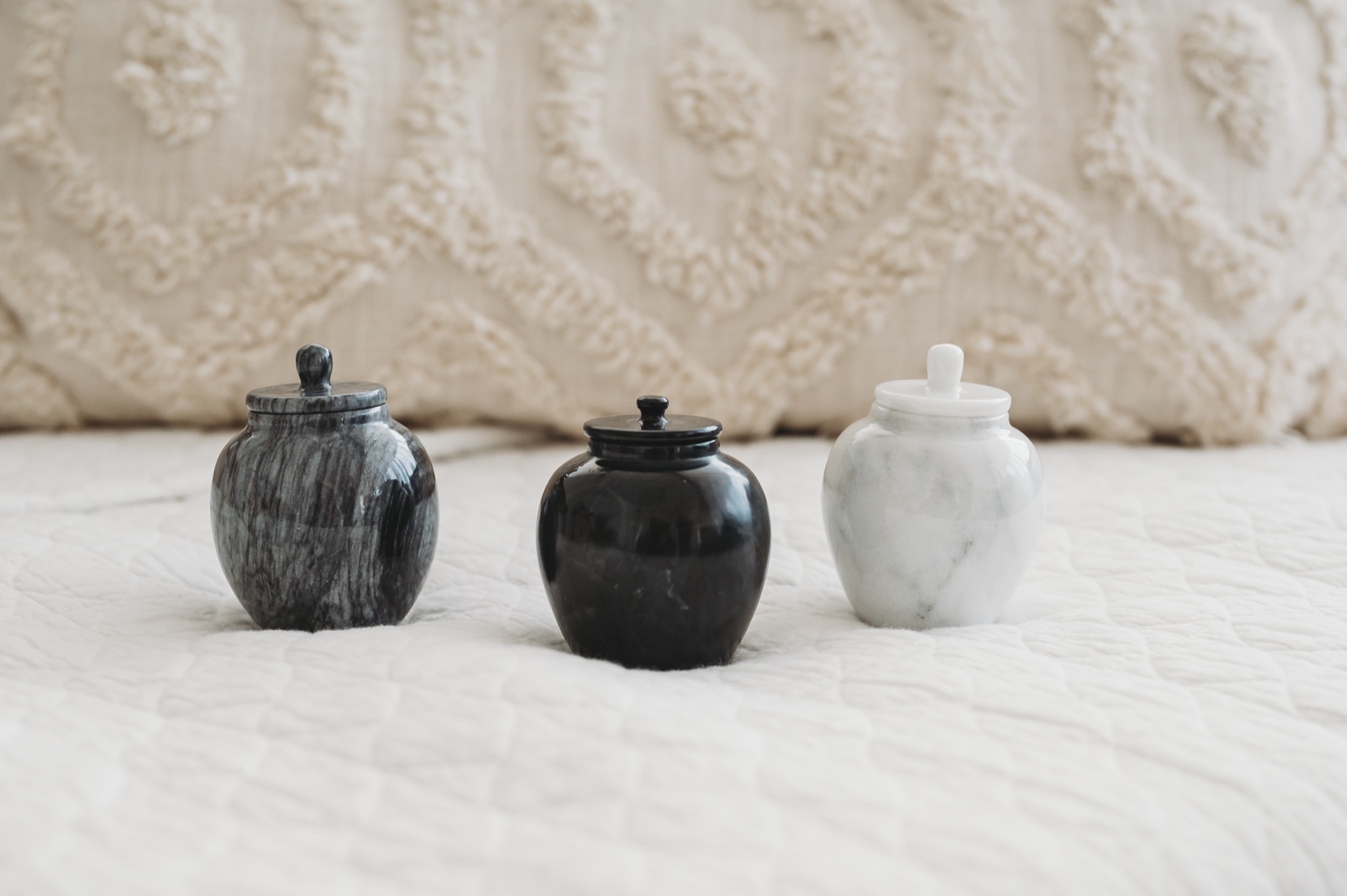 Cremation urns in a variety of designs