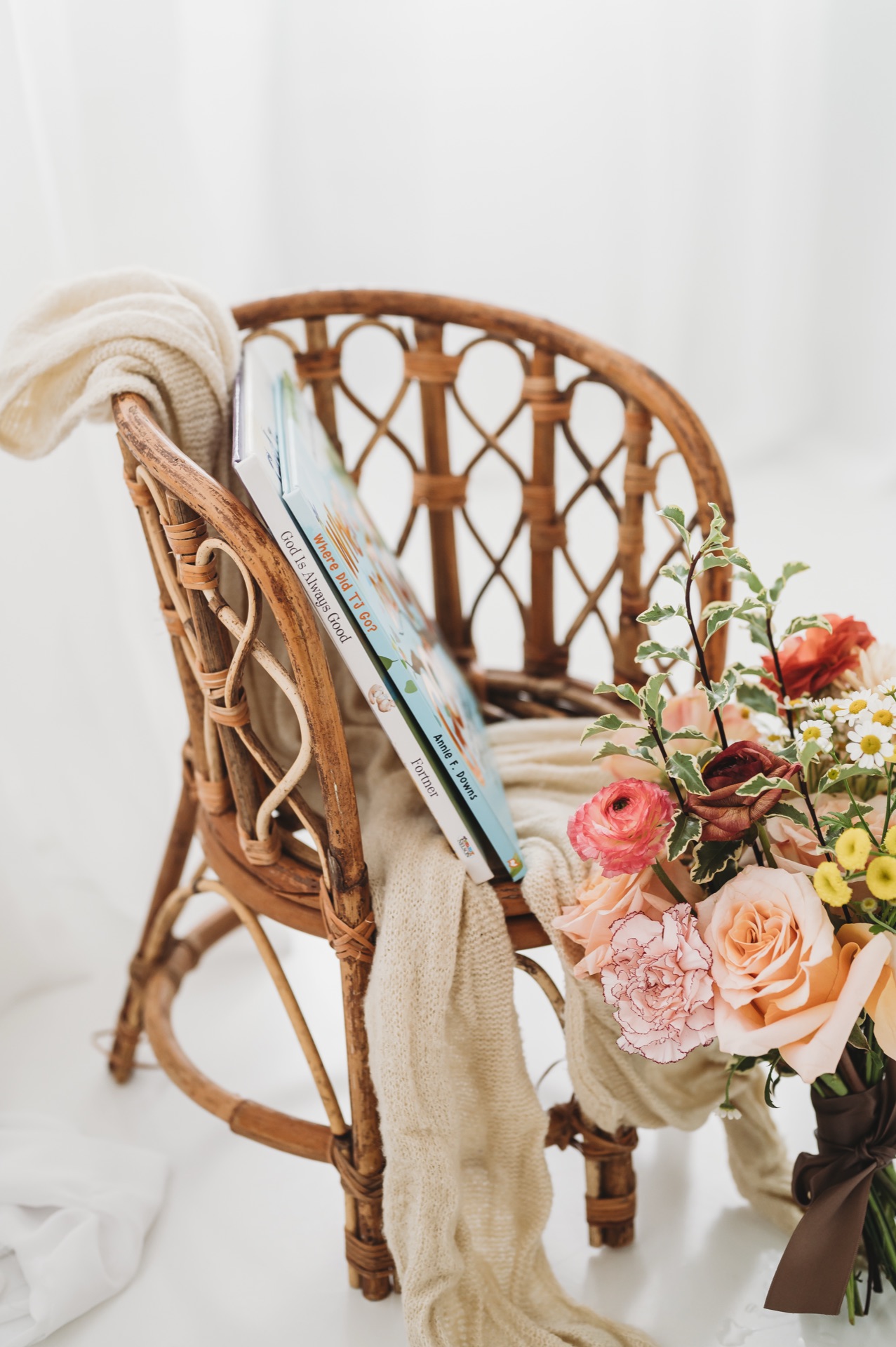 Comfort items — blanket, flowers, and memory book