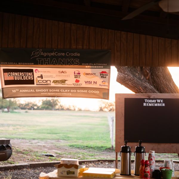 Barbecue_station_with_signage_at_dusk