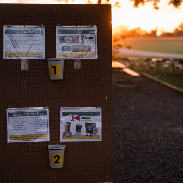 Bulletin_board_with_flyers_at_sunset