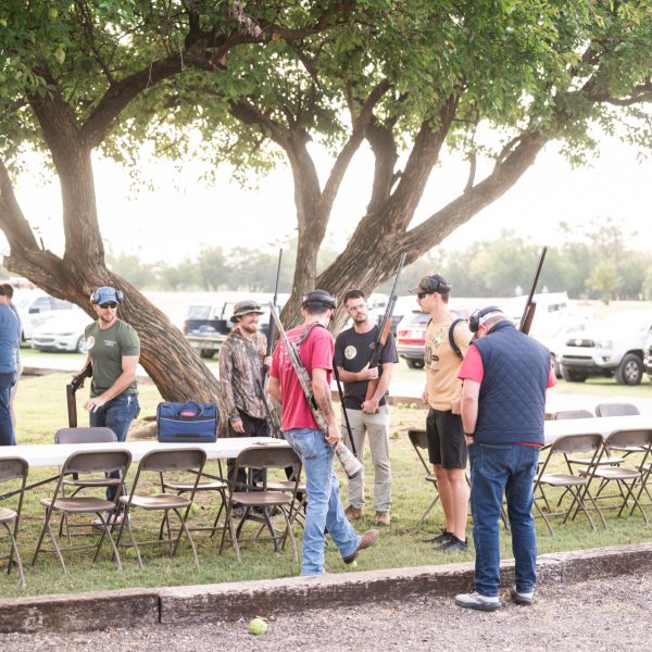 Group_of_people_at_sscdsg_with_standing_around_tables