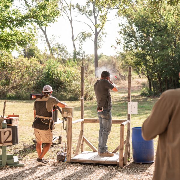 Men_shooting_at_clay_targets