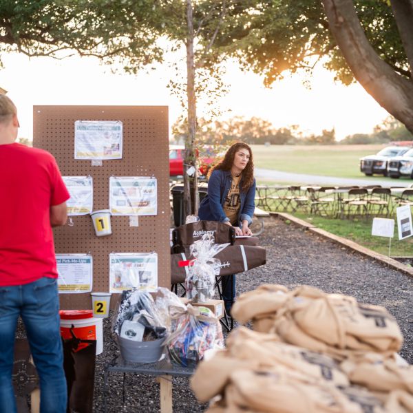 Outdoor_sscdsg_raffle_various_items_at_dusk