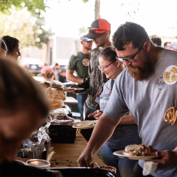 People_serving_food_at_table