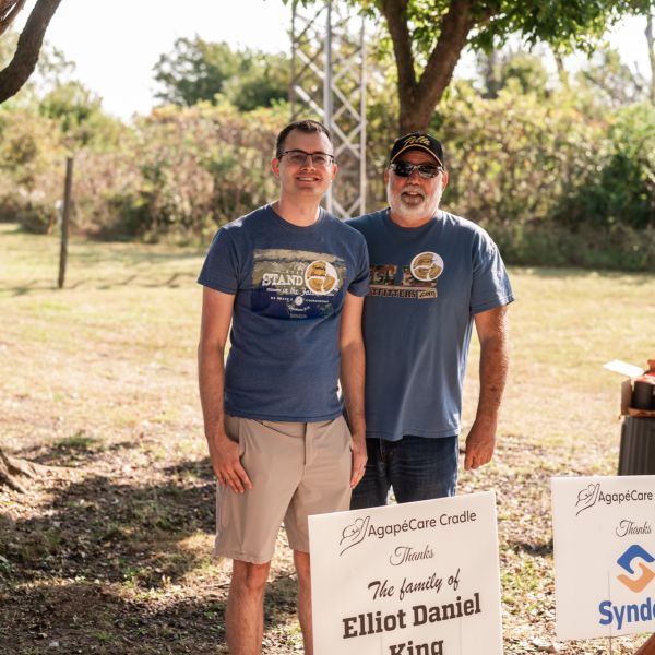 Two_men_behind_signs