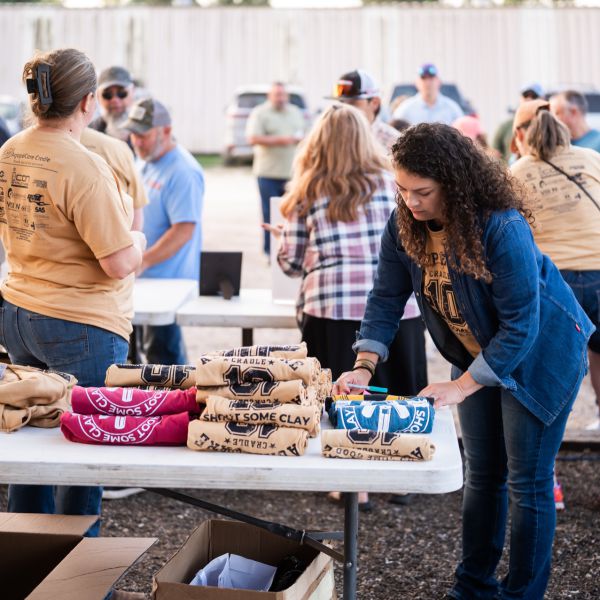 Volunteer_event_with_tables_of_merchandise