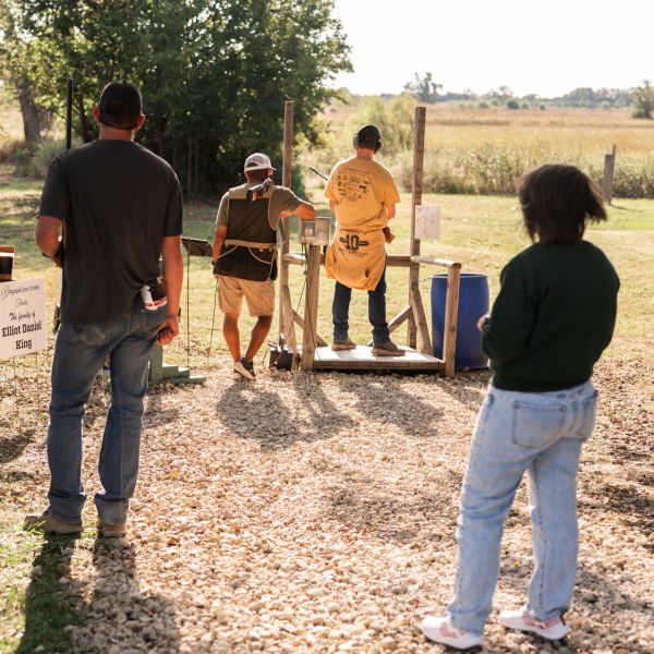 Watching_clay_shooting_outdoors