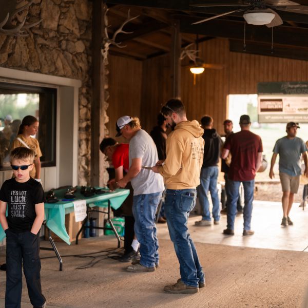 Workers_standing_around_raffle_items