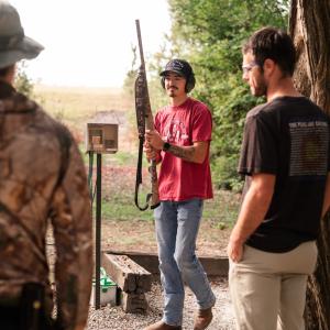 Clay_shooting_practice_with_group_of_men
