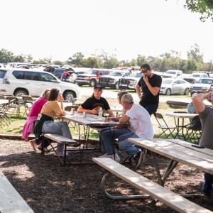Group_picnic_outdoors_under_trees