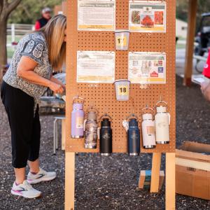 Woman_checking_information_display_raffle